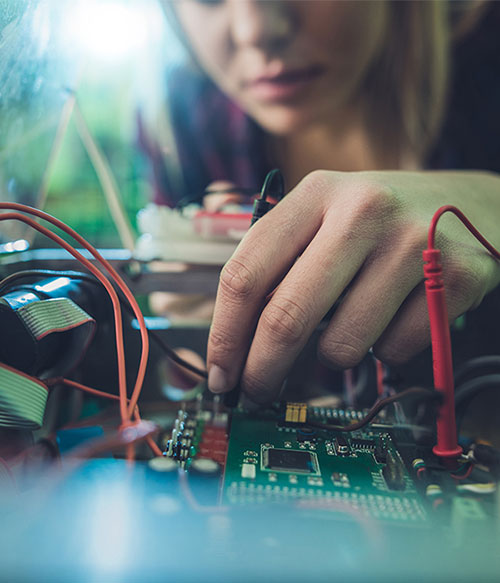 engineer-working-on-circuit-board